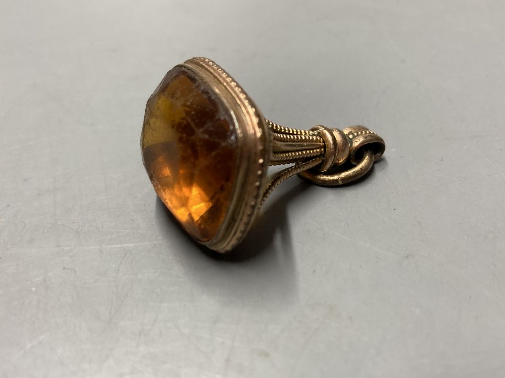 Two gold plated overlaid and gem set fob seals, largest 35mm, a 9ct front and back locket and a scroll brooch.